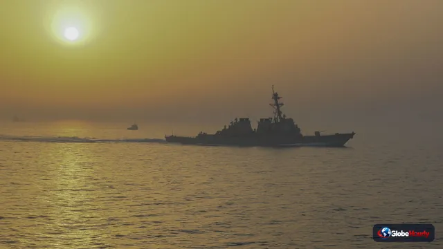 Iran's IRGC says three tankers hit mines in Hormuz; ship seen burning off Oman